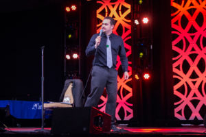 Uncle Yo Feature Image - on stage at Zenkaikon 2017 - Photo by Adam Houck